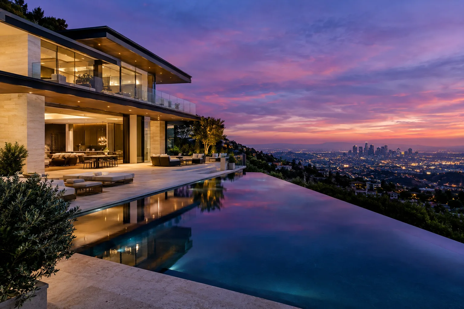 Modern hillside estate at dusk overlooking the Los Angeles basin